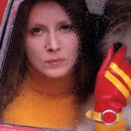 saul-leiter-woman-rain-car