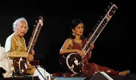 Indian sitar player Ravi Shankar performs with daughter Anoushka in the eastern Indian city of Kolkata