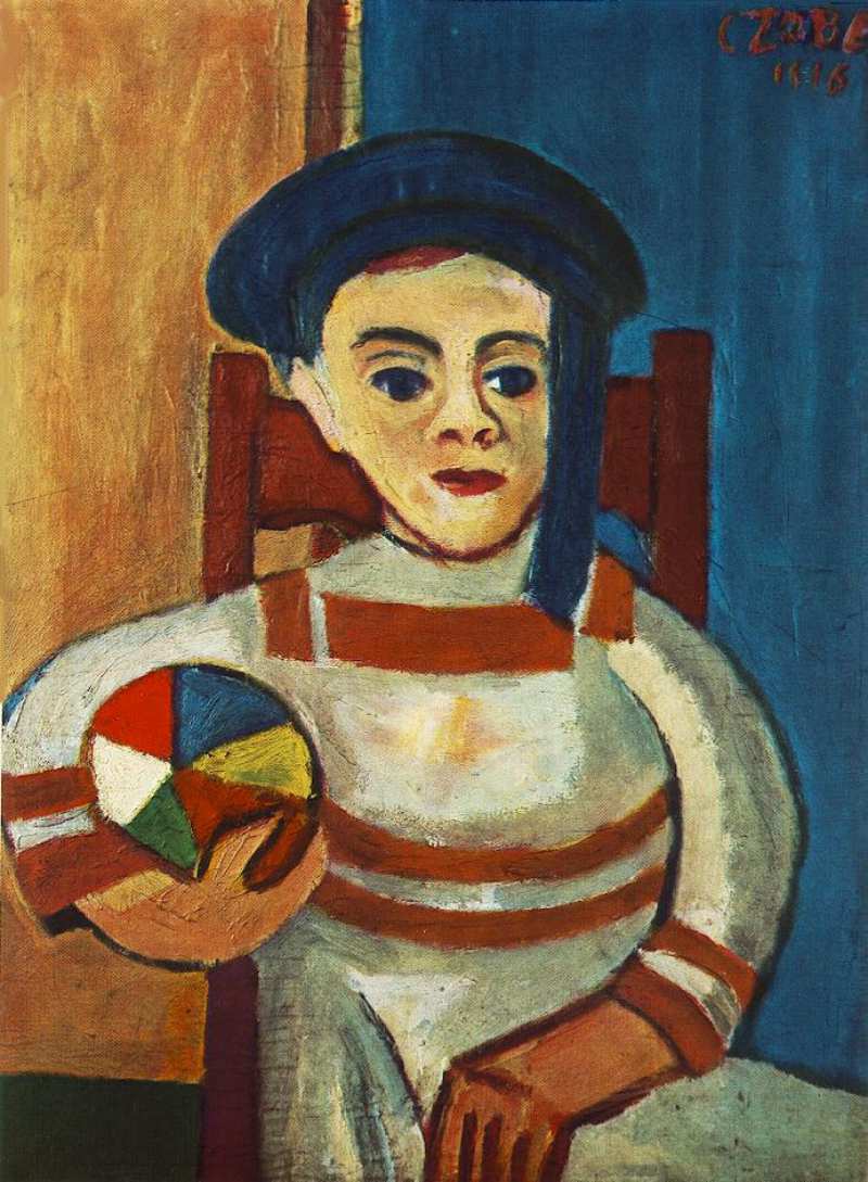 Boy Holding a Ball